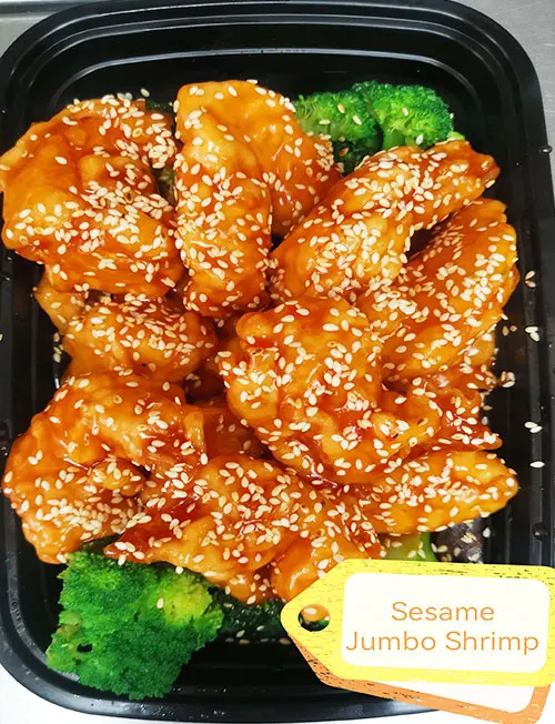 Sesame jumbo shrimp over broccoli