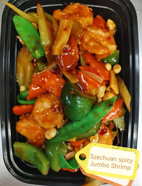 Szechuan spicy jumbo shrimp with snow peas